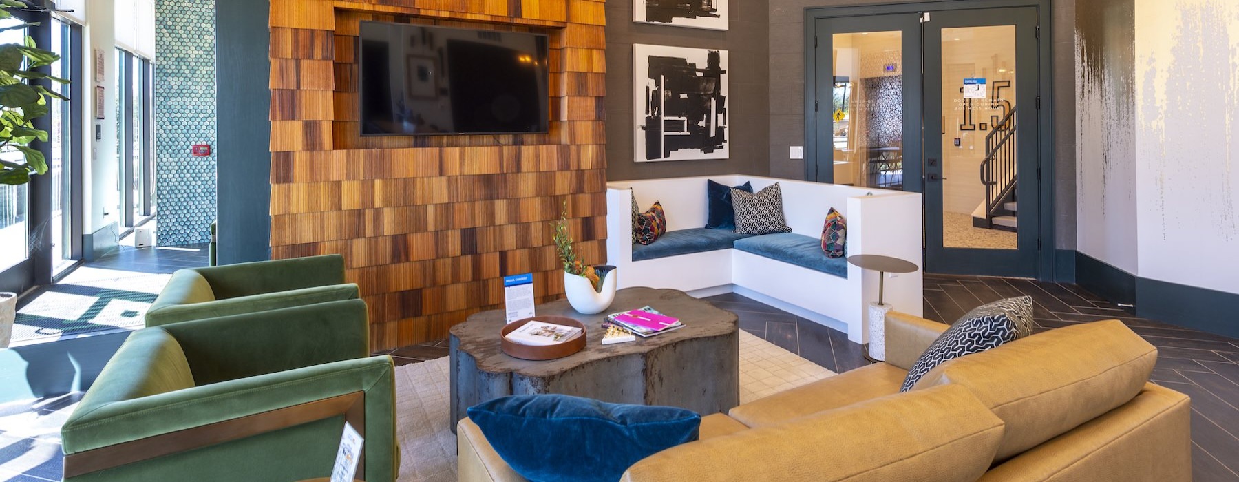 a clubroom with a tv and couch