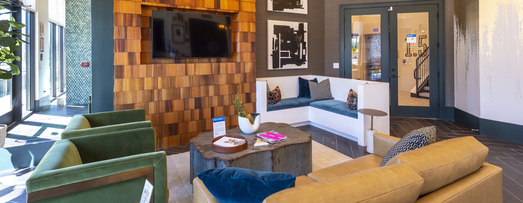 a clubroom with a tv and couch