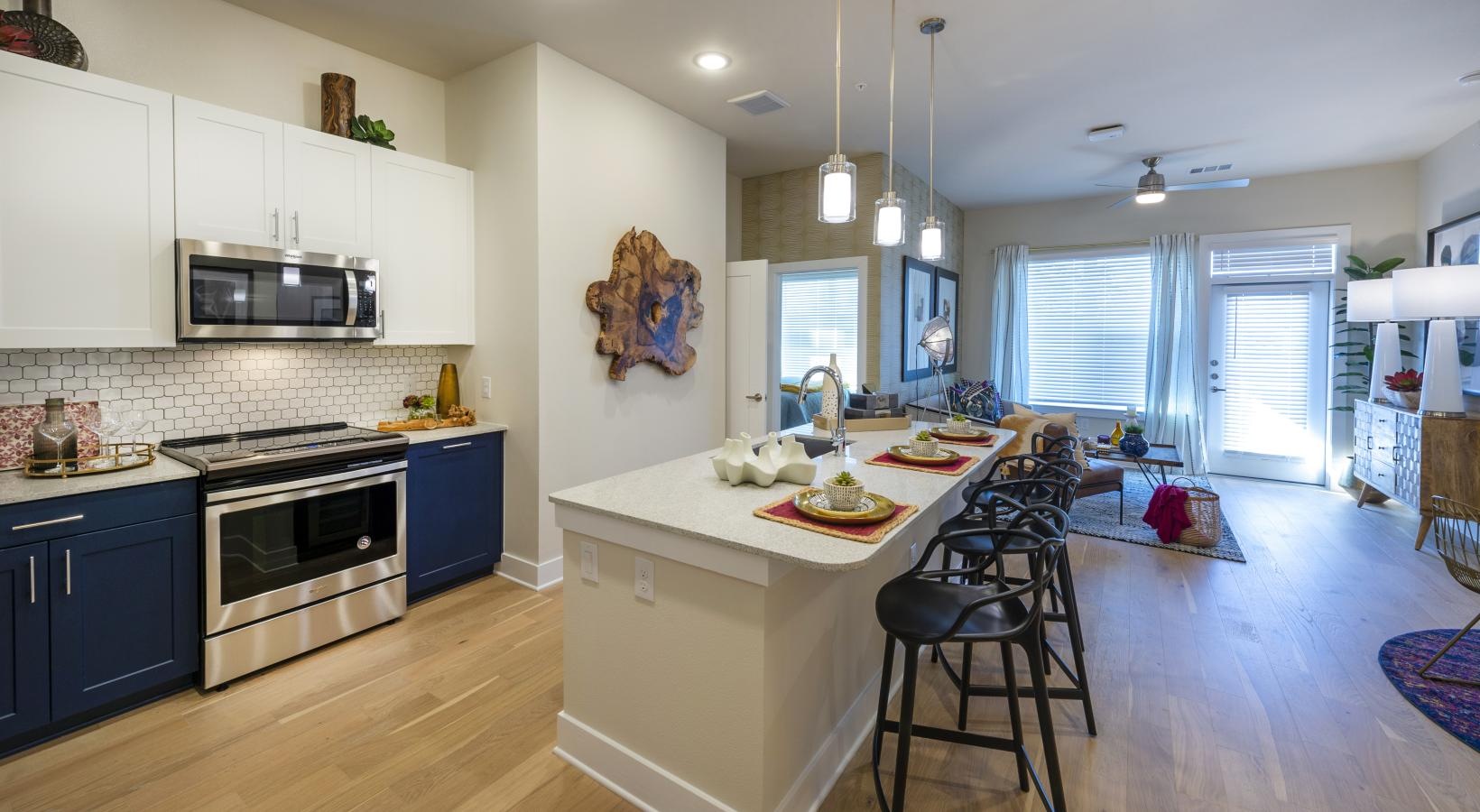 a kitchen with a table and chairs